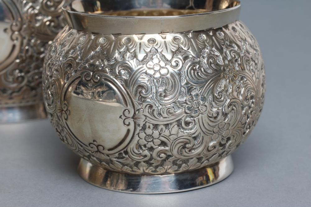 A VICTORIAN SILVER THREE PIECE TEA SERVICE Image