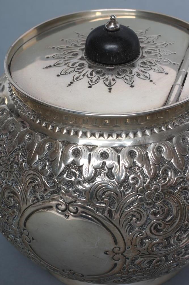 A VICTORIAN SILVER THREE PIECE TEA SERVICE Image