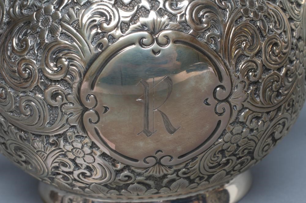 A VICTORIAN SILVER THREE PIECE TEA SERVICE Image