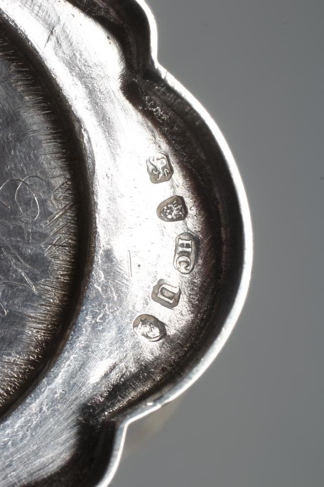 A LATE GEORGE III SILVER SUGAR BASKET Image