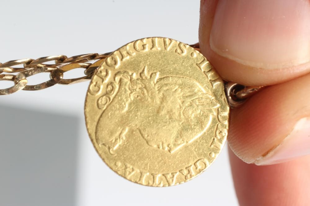 A GEORGE III GOLD HALF GUINEA Image