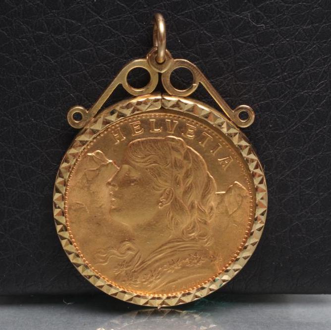 A SWISS 20F GOLD COIN Image