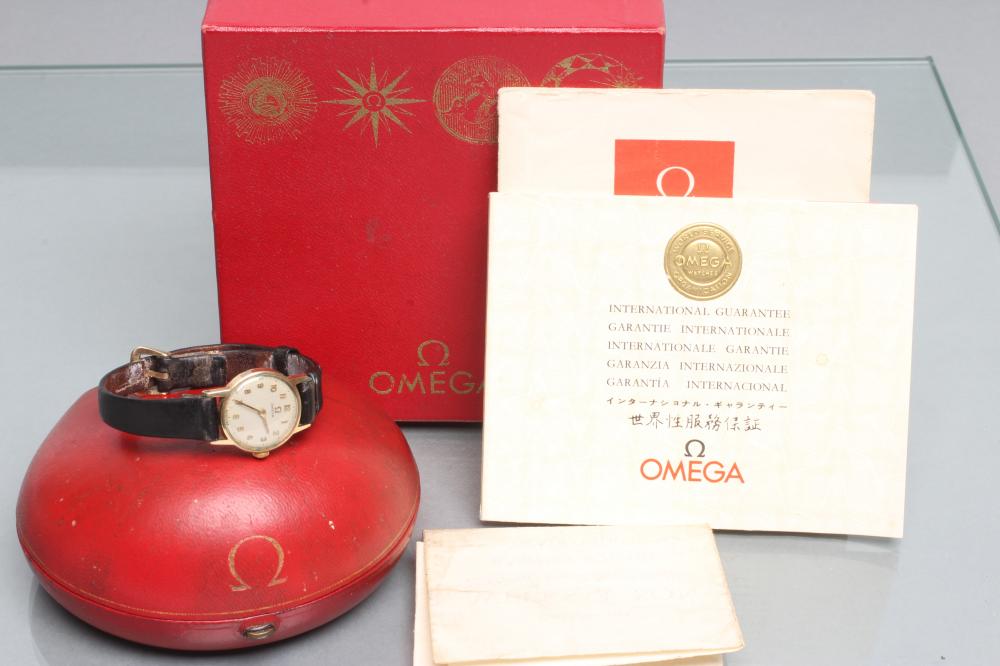 A LADY'S 9CT GOLD OMEGA WRISTWATCH Image