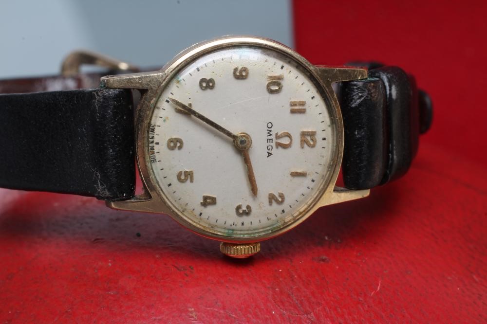 A LADY'S 9CT GOLD OMEGA WRISTWATCH Image