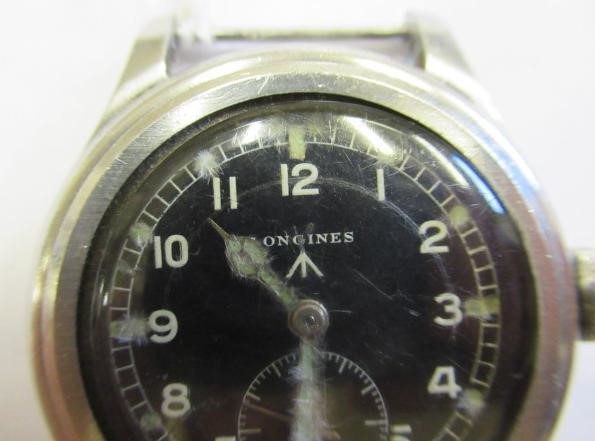 A LONGINES MILITARY ISSUE "DIRTY DOZEN" WRISTWATCH Image