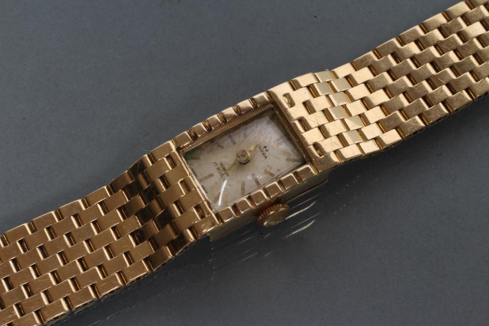 A LADY'S 18CT GOLD OEBRA WRISTWATCH Image