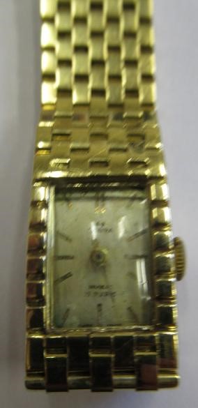 A LADY'S 18CT GOLD OEBRA WRISTWATCH Image