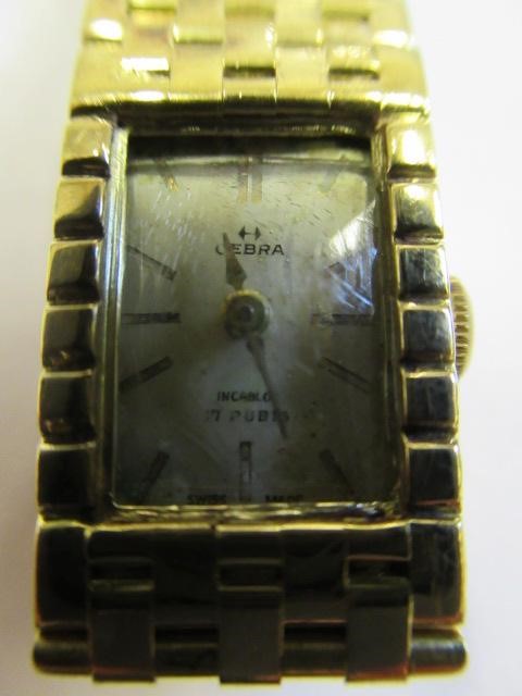 A LADY'S 18CT GOLD OEBRA WRISTWATCH Image