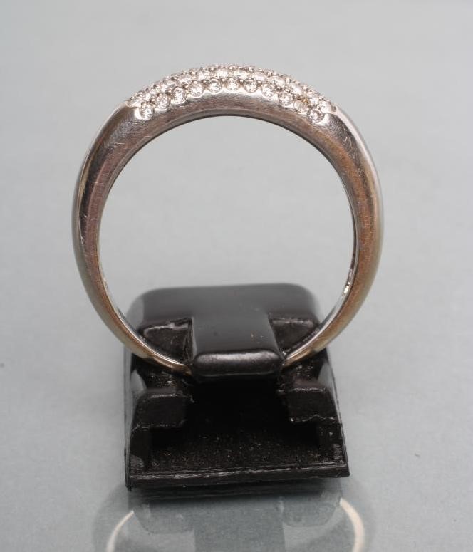 A DIAMOND HALF HOOP RING Image