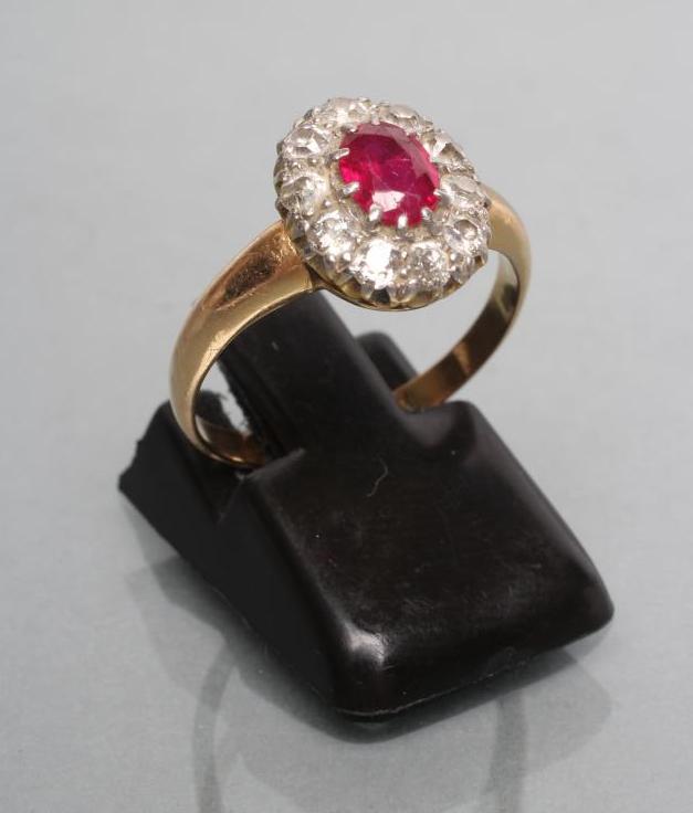 A RUBY AND DIAMOND CLUSTER RING Image