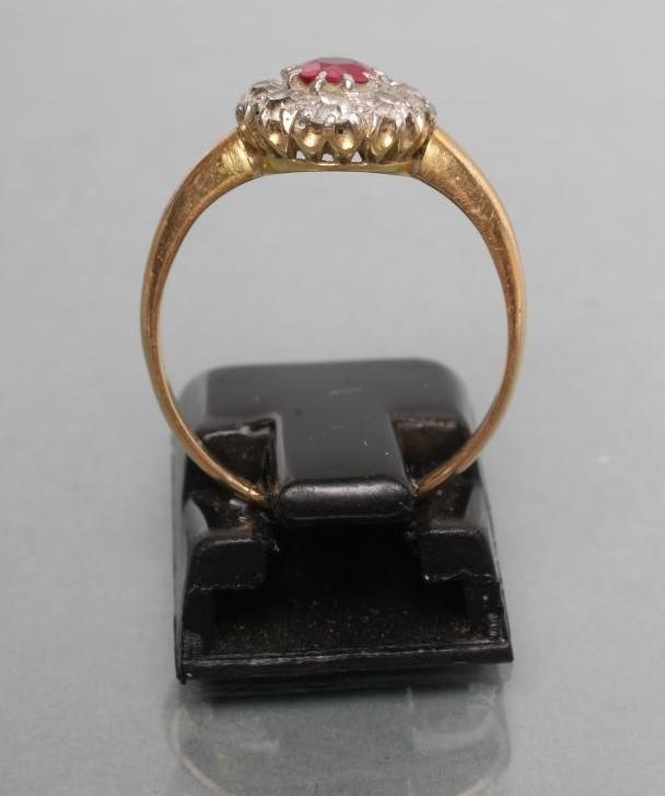 A RUBY AND DIAMOND CLUSTER RING Image