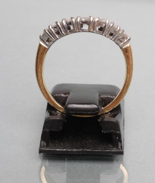 A DIAMOND HALF HOOP WISHBONE ETERNITY RING Image