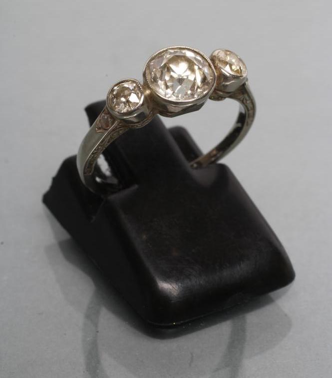 A THREE STONE DIAMOND RING Image