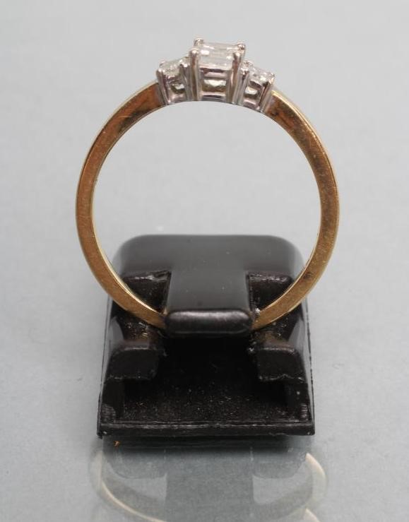 A THREE STONE DIAMOND RING Image