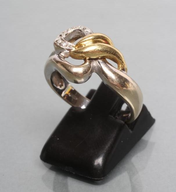 AN 18CT BI-COLOUR GOLD OPEN KNOT RING Image