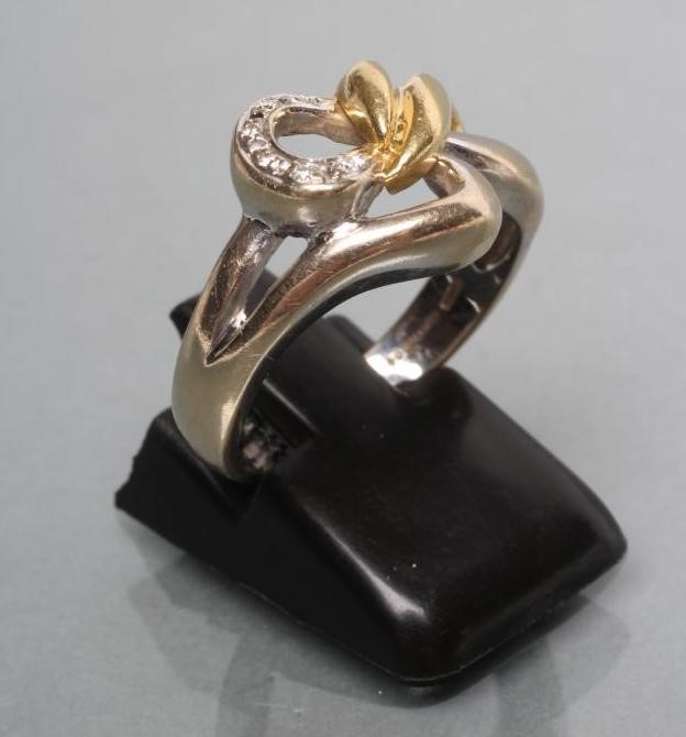 AN 18CT BI-COLOUR GOLD OPEN KNOT RING Image