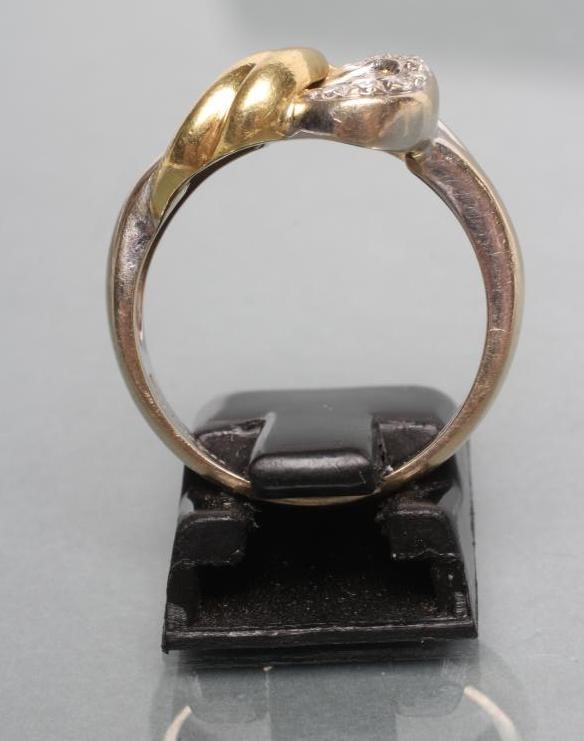 AN 18CT BI-COLOUR GOLD OPEN KNOT RING Image