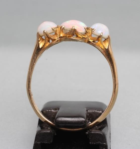 A THREE STONE OPAL RING Image