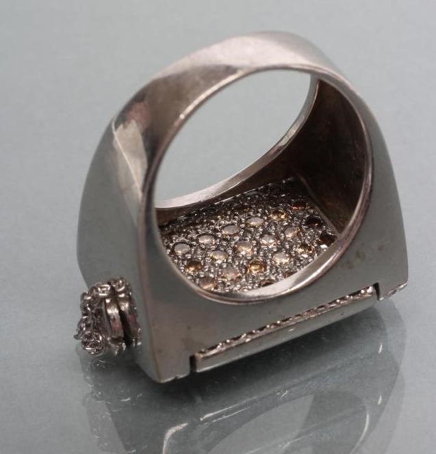 A GENTLEMAN'S DIAMOND "REVERSO" RING Image