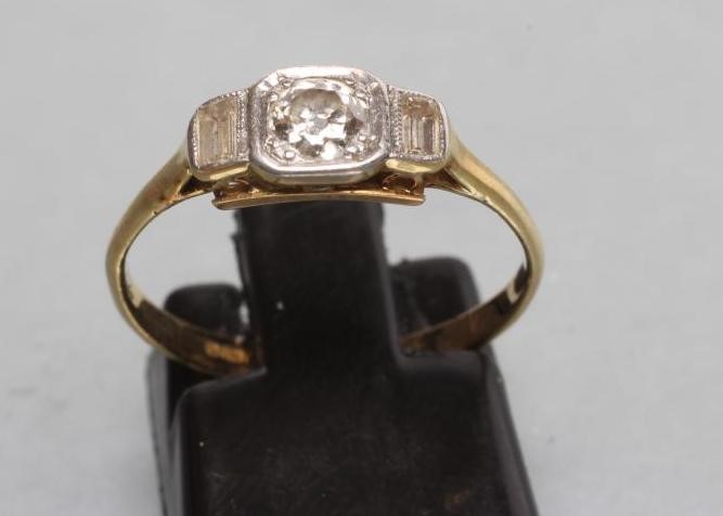 A THREE STONE DIAMOND RING Image
