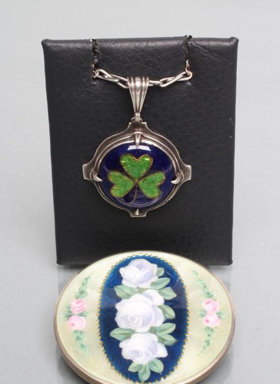 A CONTINENTAL SILVER AND GUILLOCHE ENAMEL CIRCULAR BROOCH Image