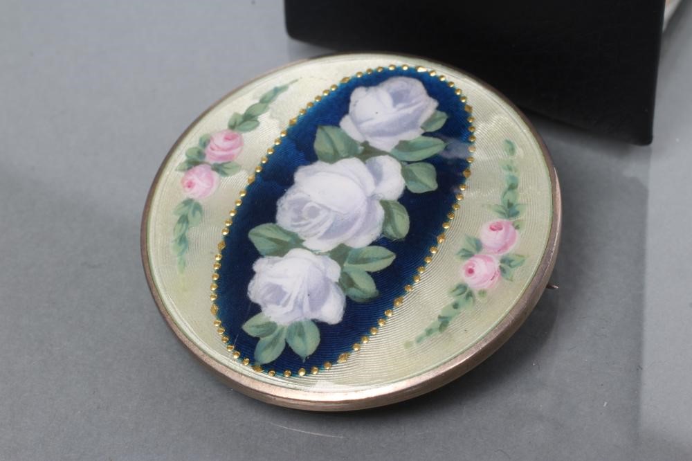 A CONTINENTAL SILVER AND GUILLOCHE ENAMEL CIRCULAR BROOCH Image