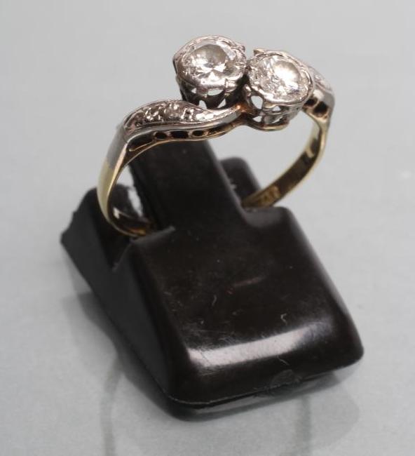 A TWO STONE DIAMOND RING Image