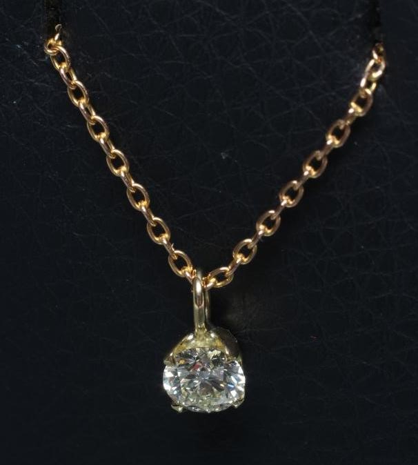 A SOLITAIRE DIAMOND PENDANT Image