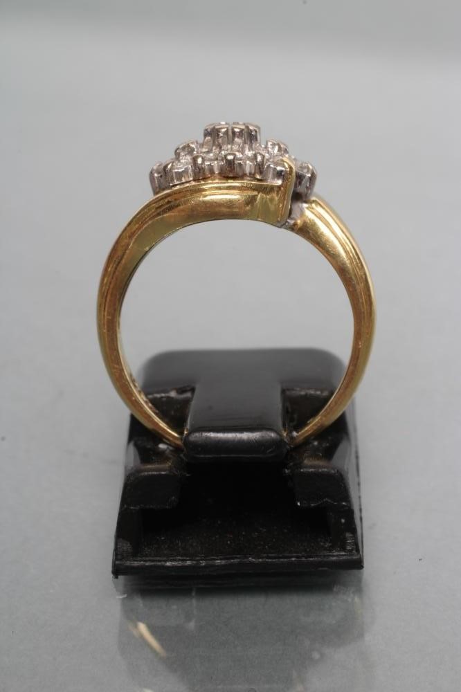 A DIAMOND CLUSTER RING Image