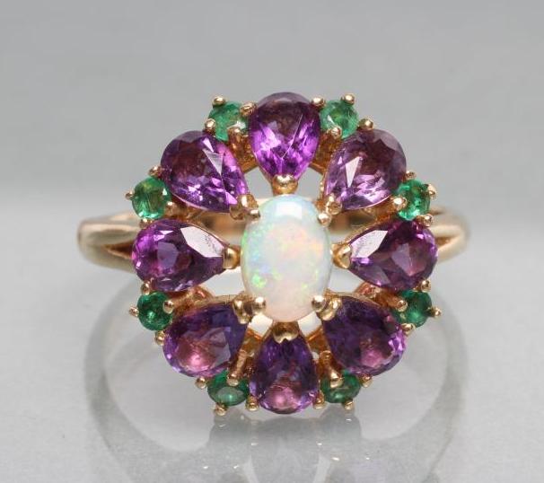 A GEM SET FLOWERHEAD COCKTAIL RING Image