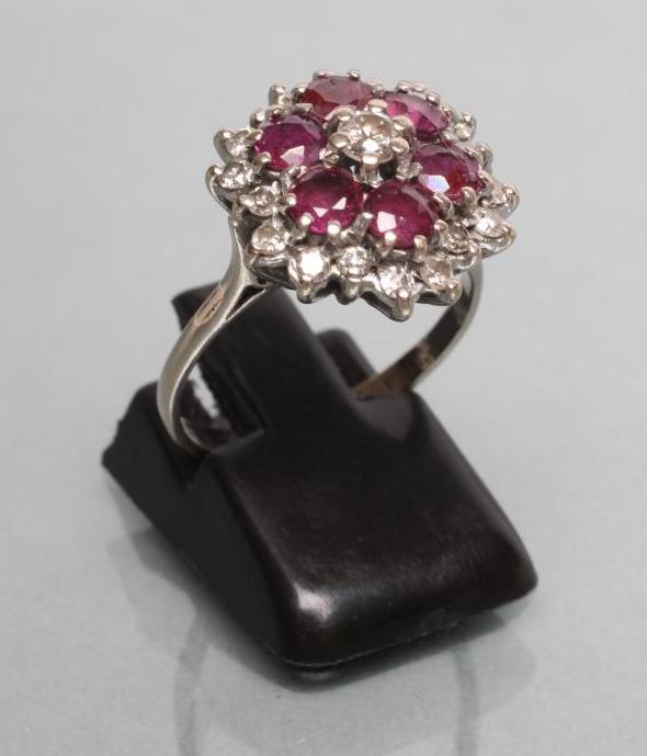 A RUBY AND DIAMOND CLUSTER RING Image