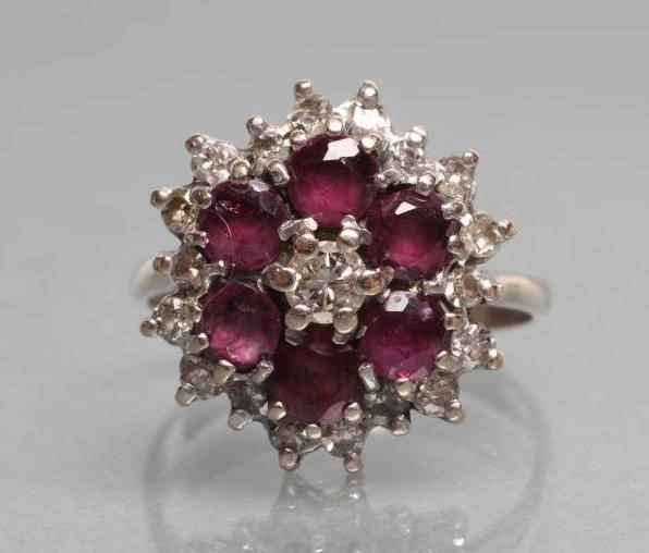 A RUBY AND DIAMOND CLUSTER RING Image