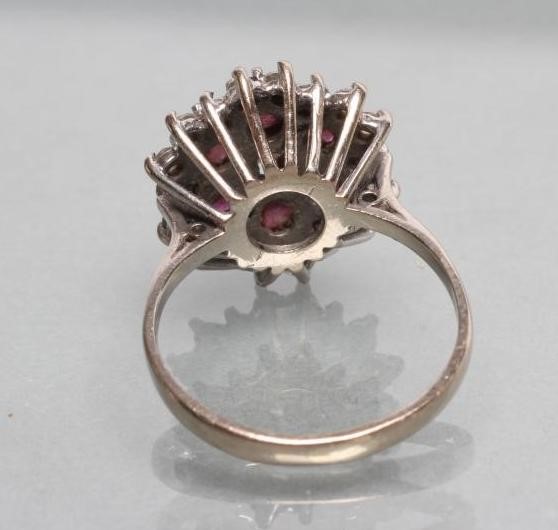 A RUBY AND DIAMOND CLUSTER RING Image