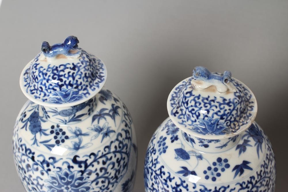 A PAIR OF CHINESE PORCELAIN VASES AND COVERS of inverted baluster form Image
