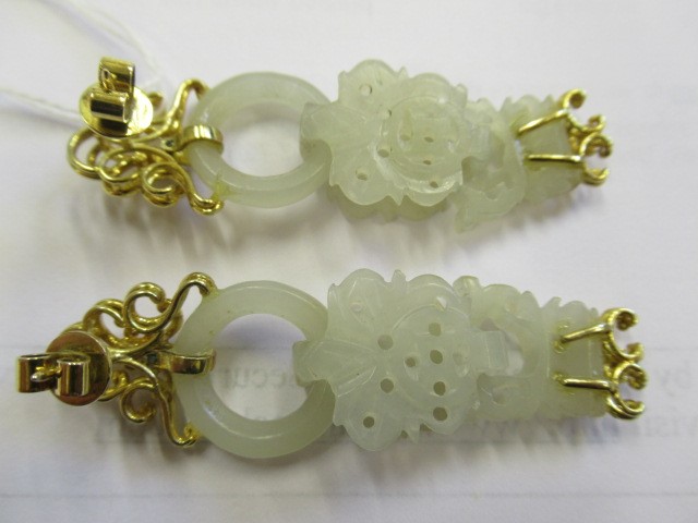 A PAIR OF CHINESE JADE EAR DROPS Image