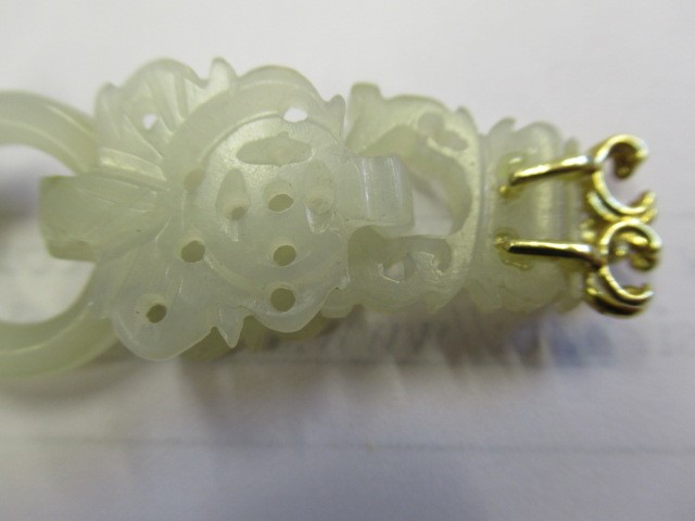 A PAIR OF CHINESE JADE EAR DROPS Image