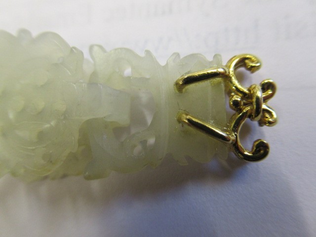 A PAIR OF CHINESE JADE EAR DROPS Image