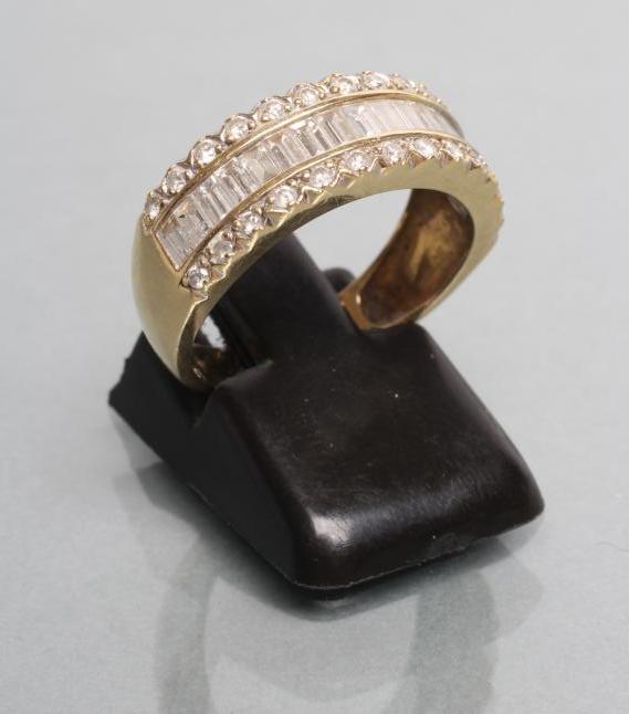 A DIAMOND HALF HOOP RING Image