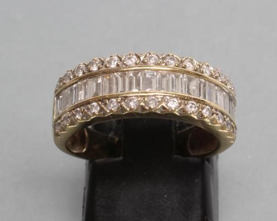 A DIAMOND HALF HOOP RING Image