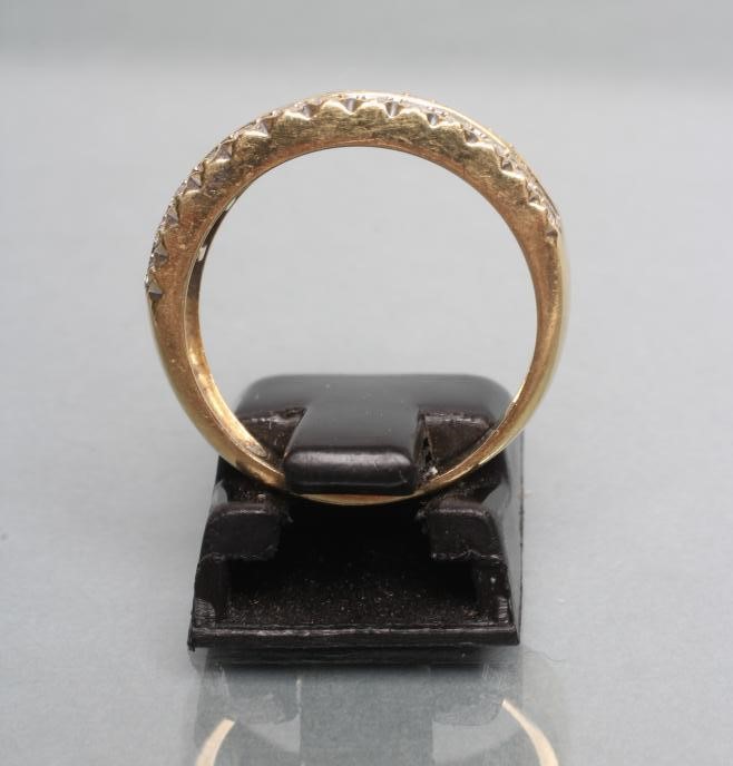 A DIAMOND HALF HOOP RING Image