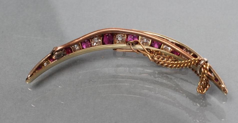A RUBY AND DIAMOND CRESCENT BROOCH Image