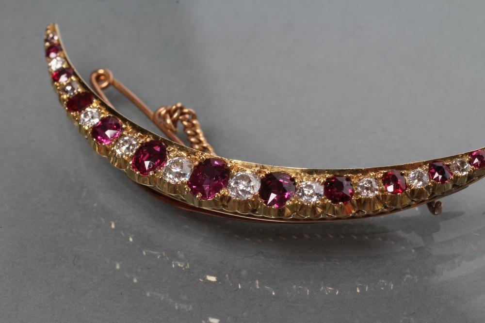 A RUBY AND DIAMOND CRESCENT BROOCH Image