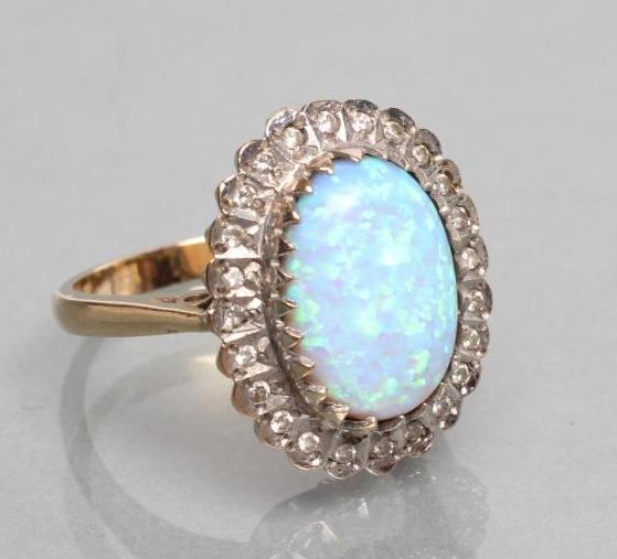 A SYNTHETIC OPAL AND DIAMOND COCKTAIL RING Image