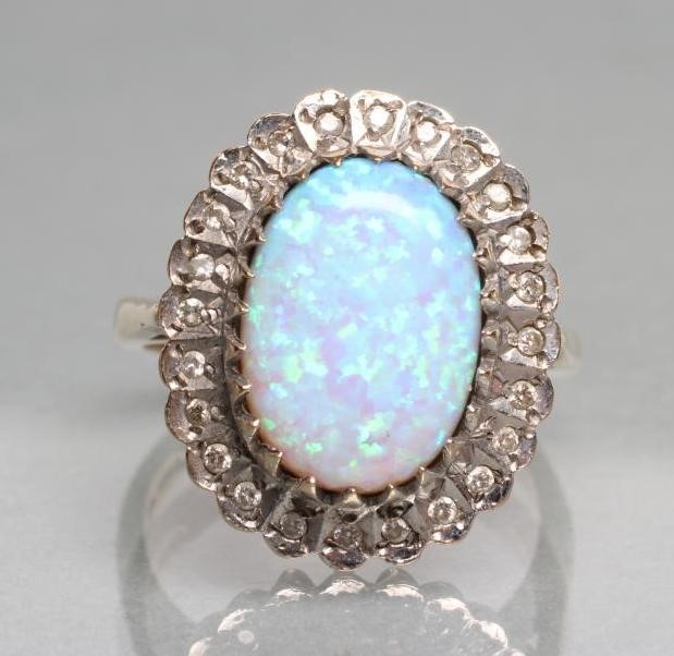 A SYNTHETIC OPAL AND DIAMOND COCKTAIL RING Image