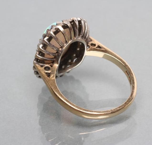 A SYNTHETIC OPAL AND DIAMOND COCKTAIL RING Image