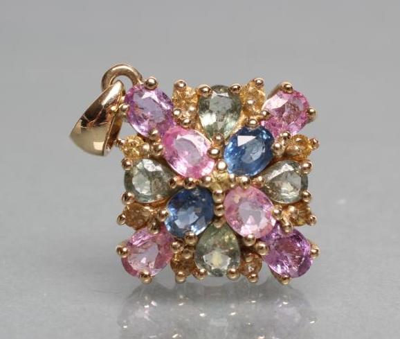 A COLOURED SAPPHIRE PENDANT of quatrefoil form Image