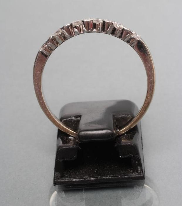 A DIAMOND HALF HOOP RING Image