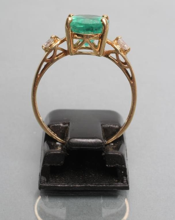 AN EMERALD RING Image