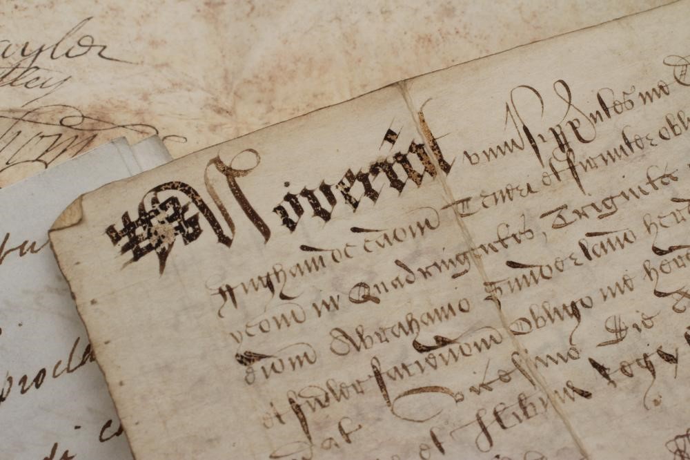 A COLLECTION OF FOURTEEN 16TH CENTURY AND LATER VELLUM AND PAPER MANUSCRIPTS Image