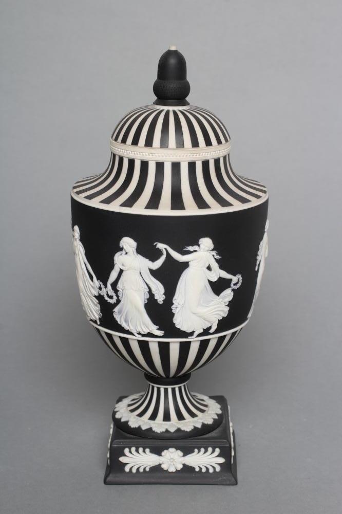 A WEDGWOOD BLACK JASPER DIP "DANCING HOURS" VASE AND COVER Image